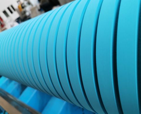 Rubber coated rolls