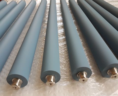 Rubber coated rolls